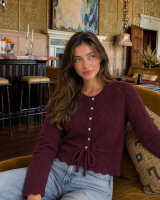 KNITTED SWEATER WITH WAIST TIE