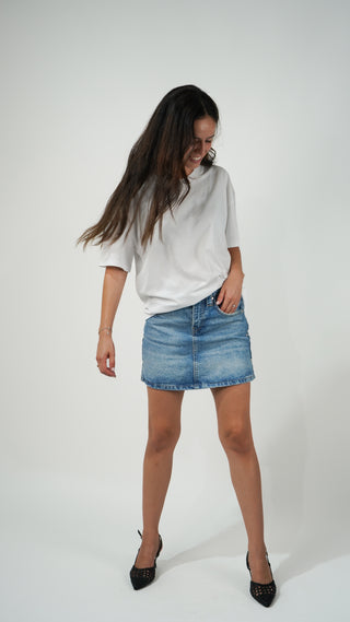 MINI FALDA VIRAGO CON TACHAS