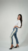 Denim + plumas blancas