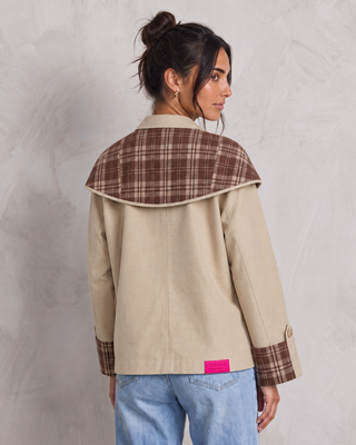 TRENCH CON CAPA REVERSIBLE